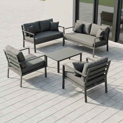Stylish outdoor furniture arranged on a paver patio