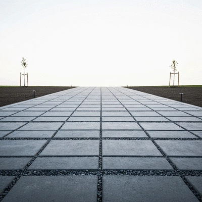 A stylish eco-friendly concrete driveway with permeable design